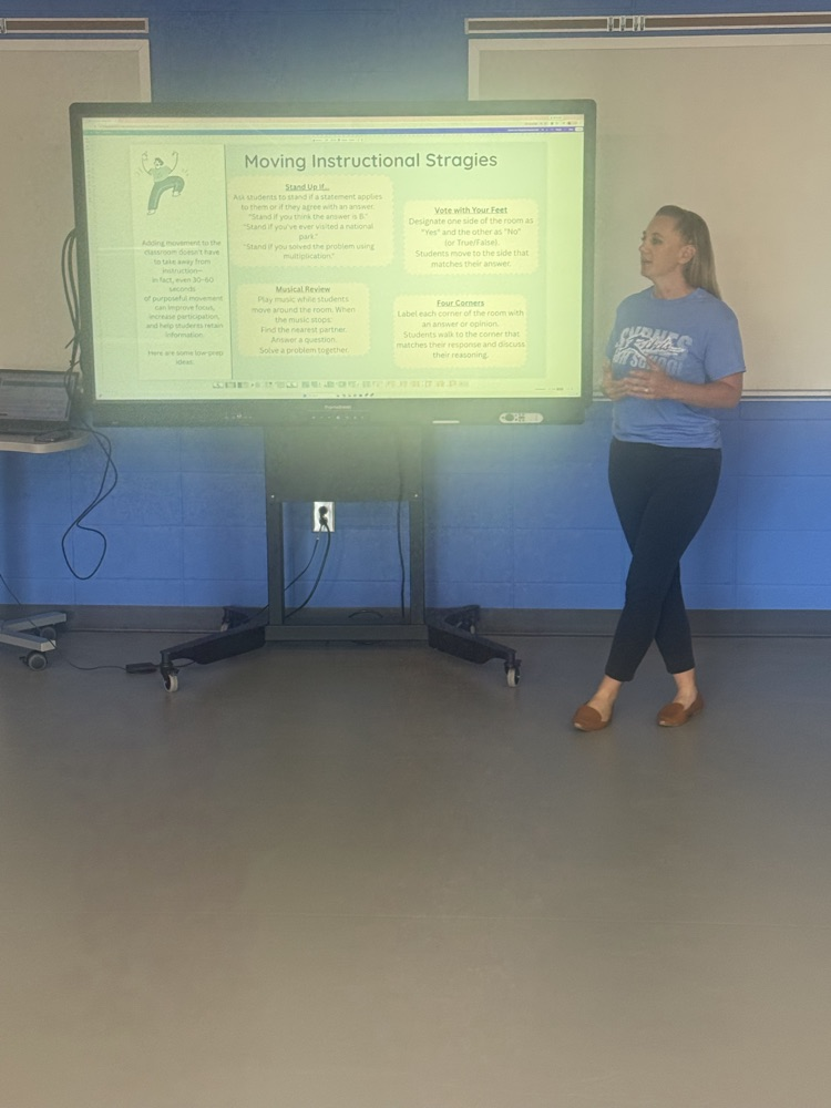teacher standing at board