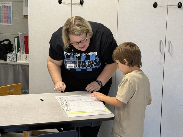children working and playing in a classroom