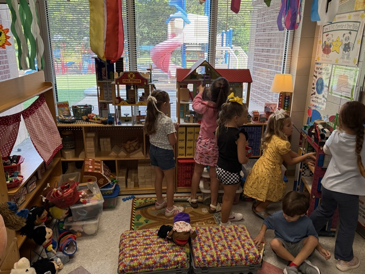 students playing in construction station 