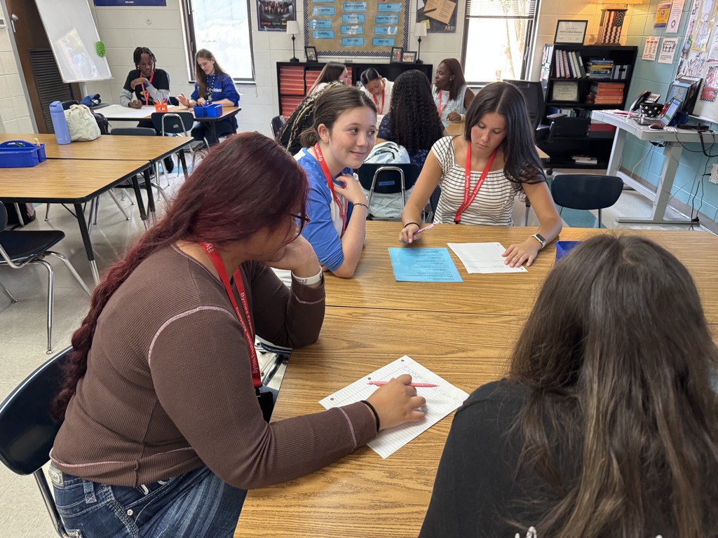students collaborating in a group activity
