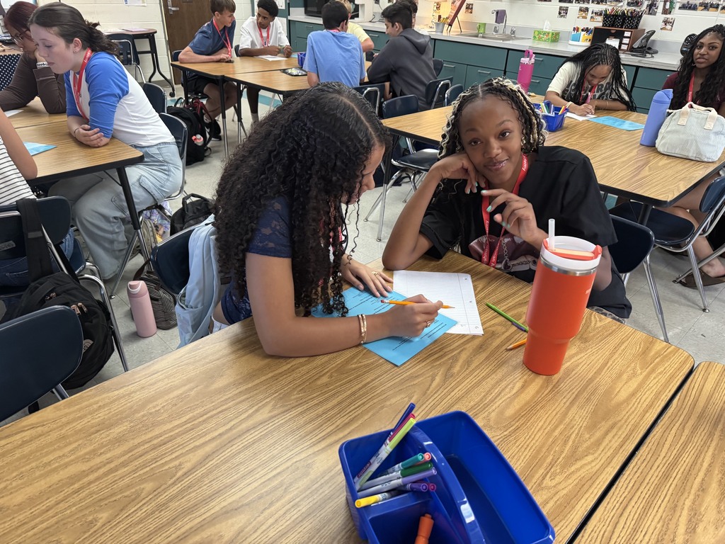 students collaborating in a group activity