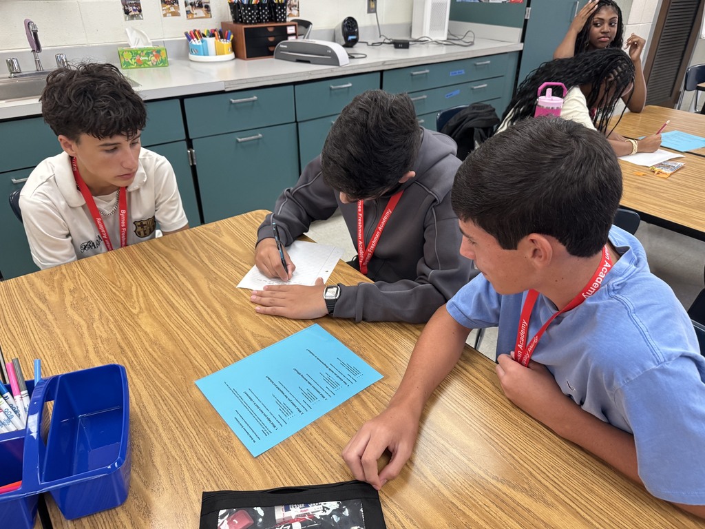 students collaborating in a group activity