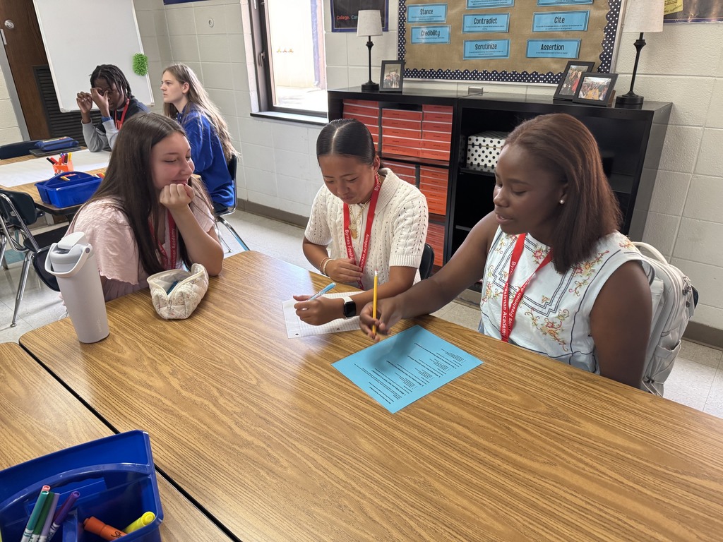 students collaborating in a group activity