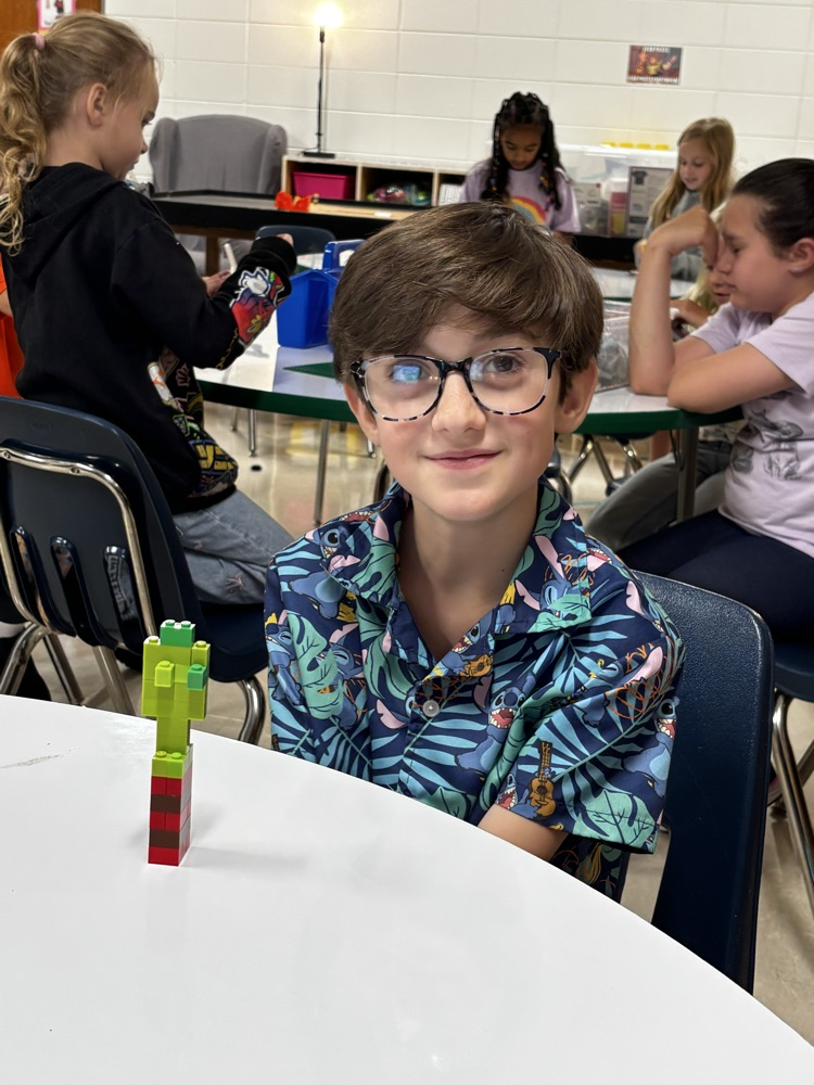 student built a strawberry out of LEGO bricks
