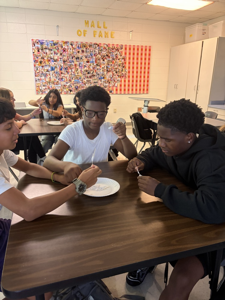 students working together with toothepaste