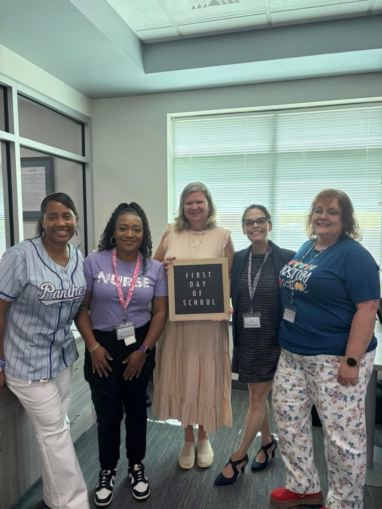 front office staff smiling