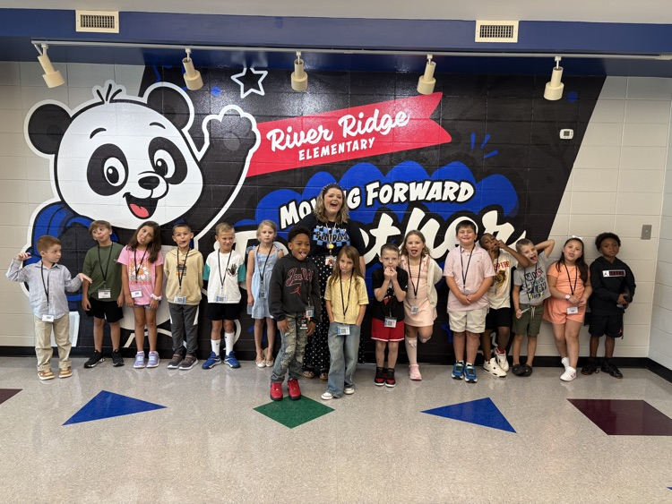 second grade class posed together 