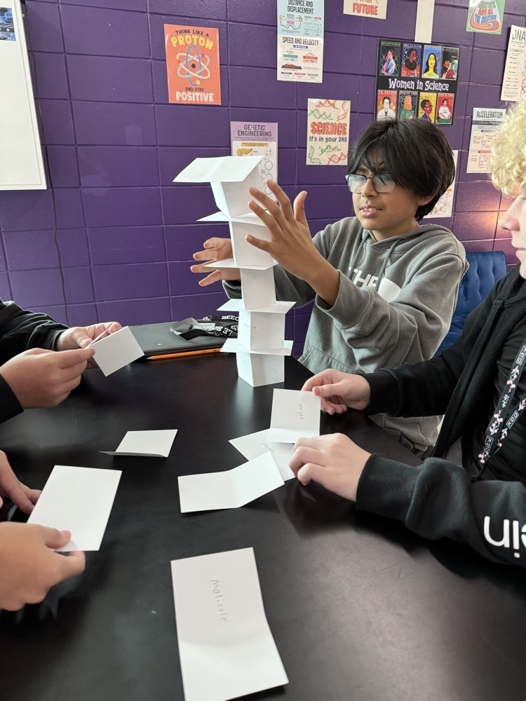 students building a tower