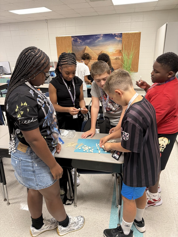 students making a tower