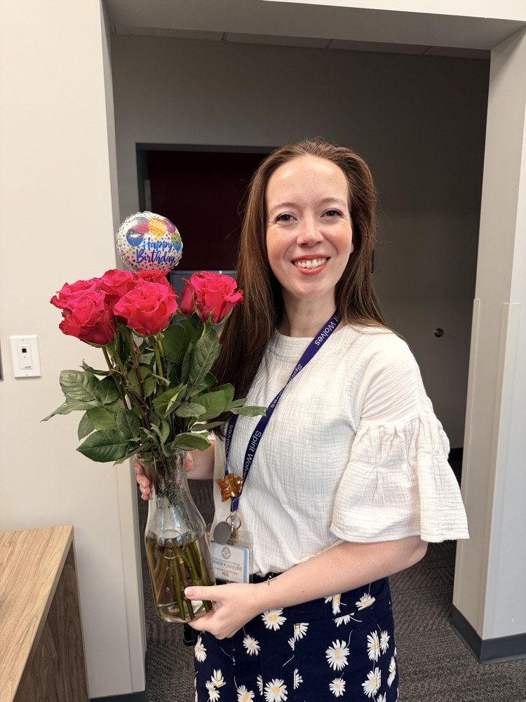 ms. McLeer with flowers