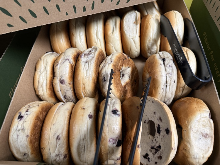 close up of bagels in a box 