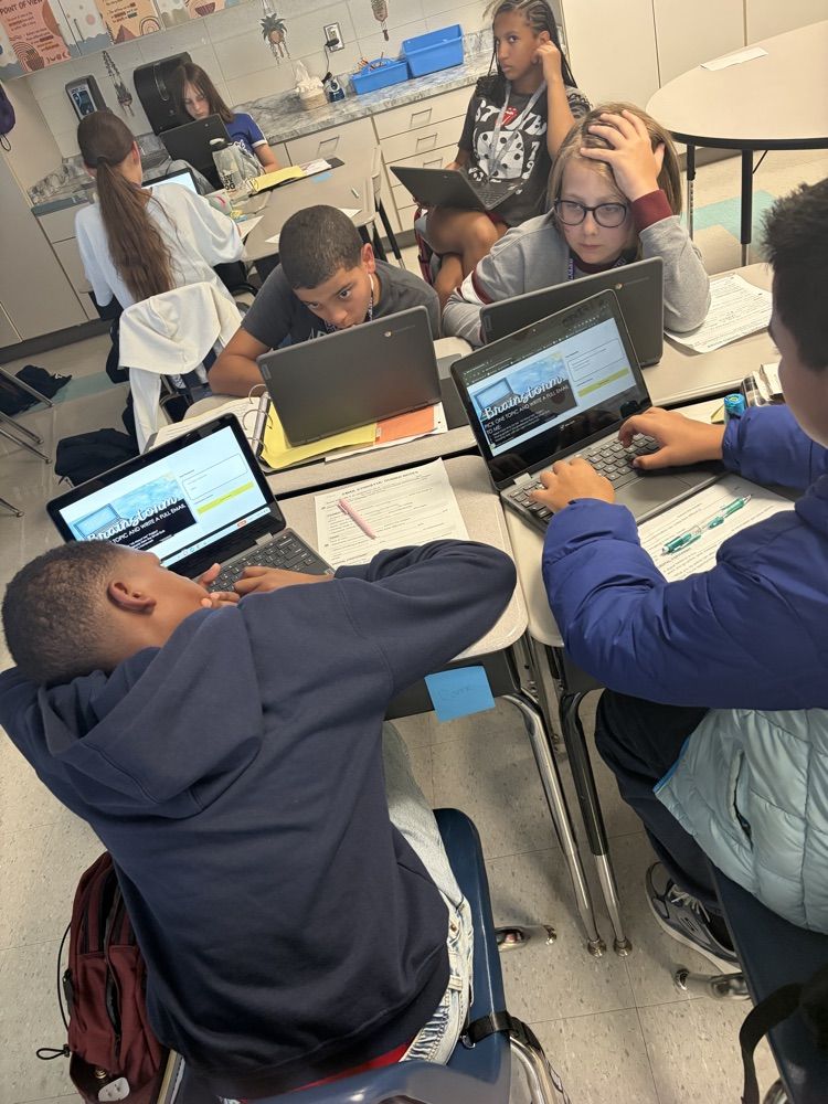 students at laptops 