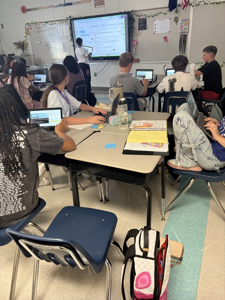 students at laptops 