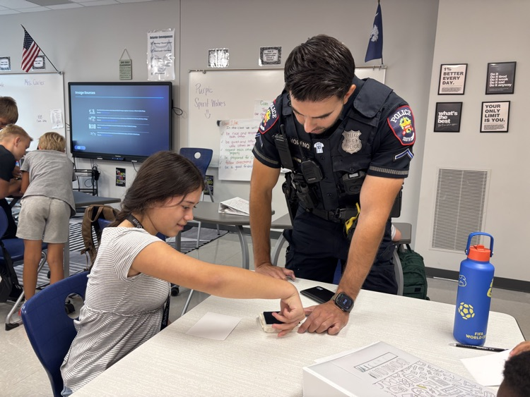 kids getting fingerprinted