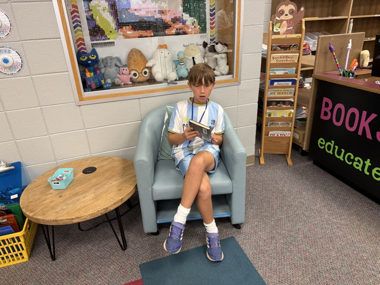 students reading in the library 