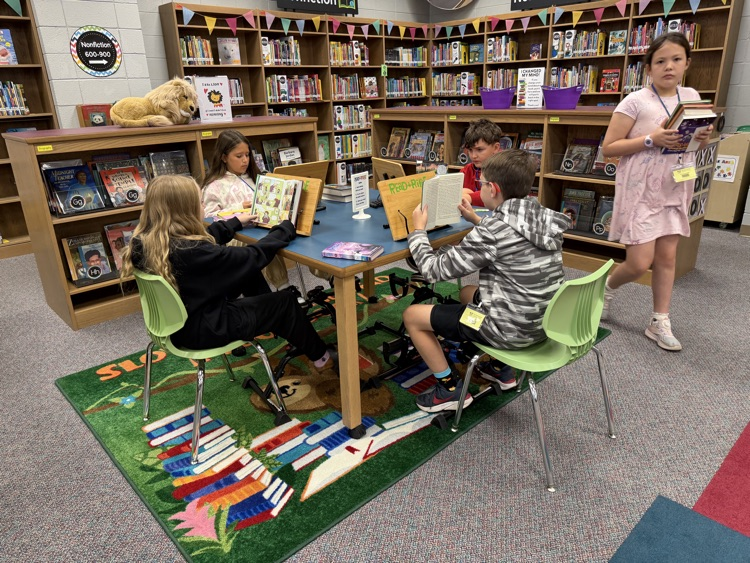 students reading in the library 