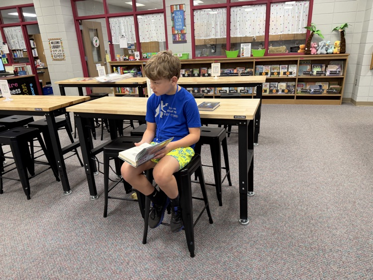 students reading in the library 