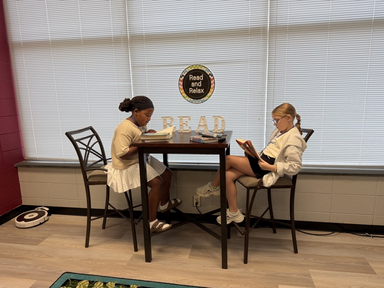 students reading in the library 