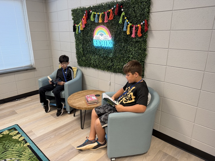students reading in the library 