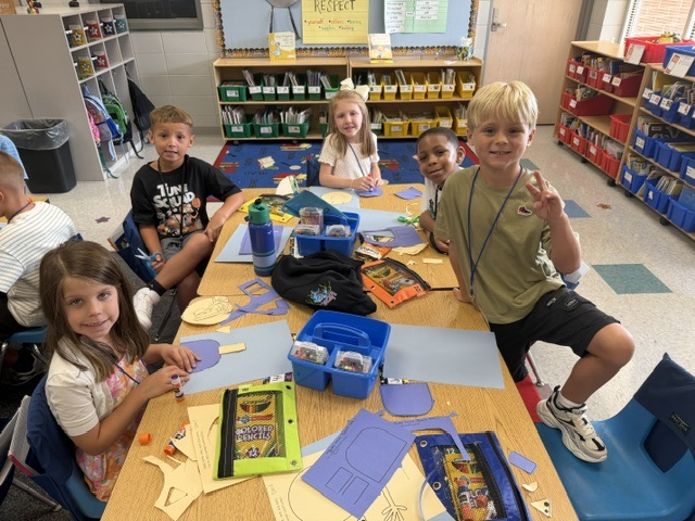 students building with blocks and STEM toys