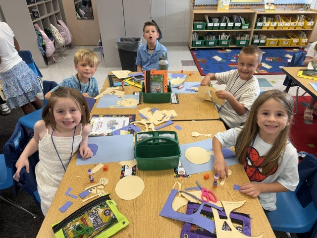 students building with blocks and STEM toys