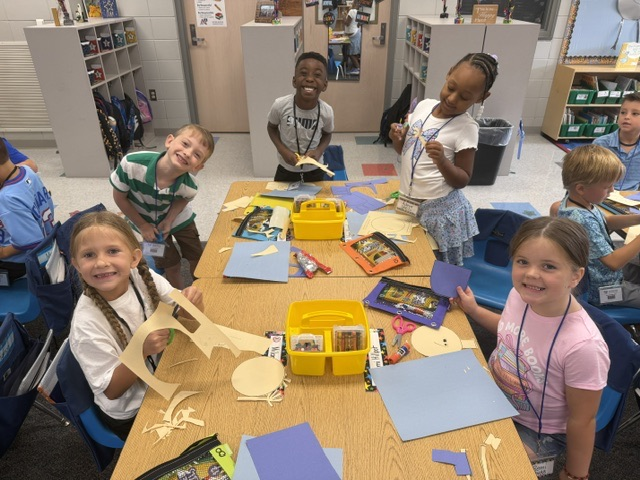 students building with blocks and STEM toys