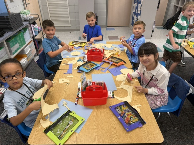 students building with blocks and STEM toys