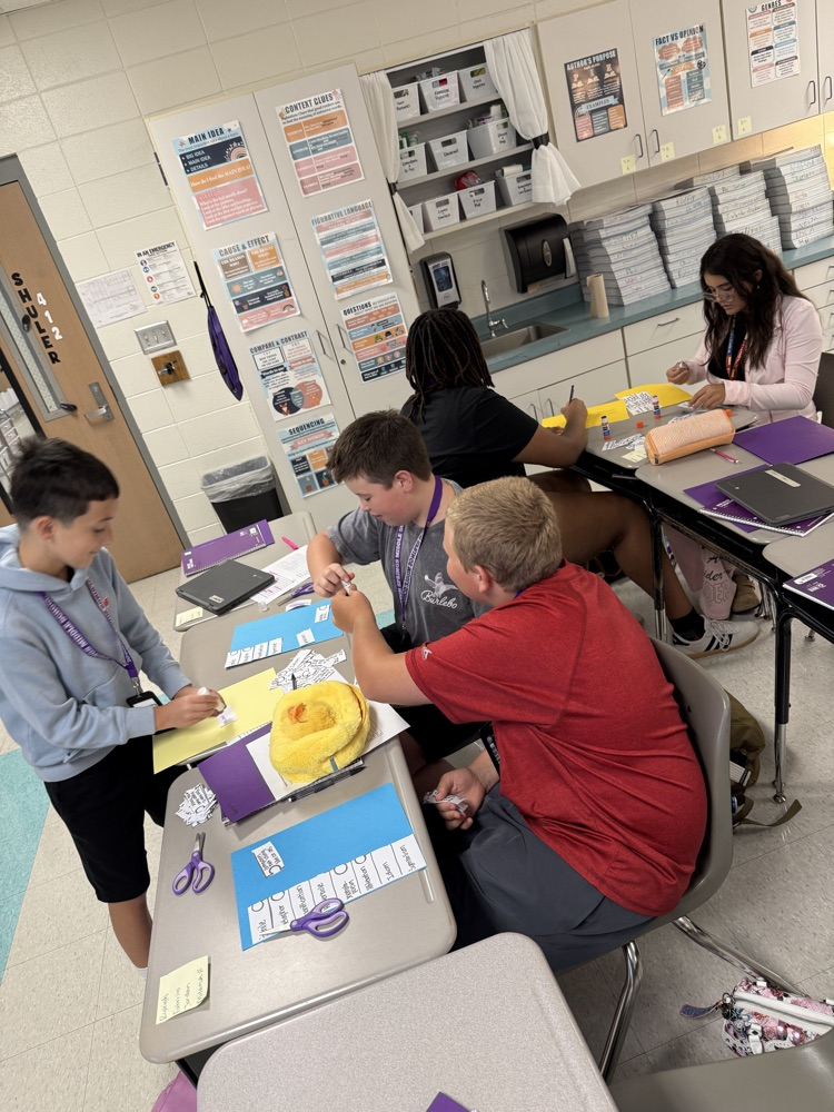 students working together at desks