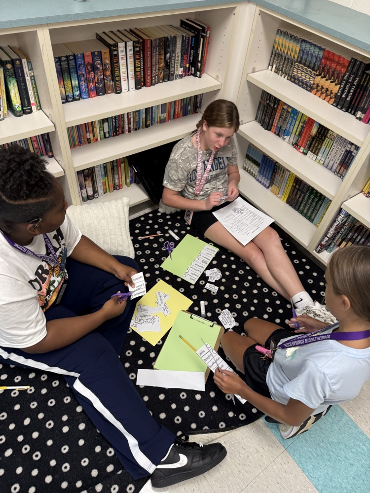 students sitting down together