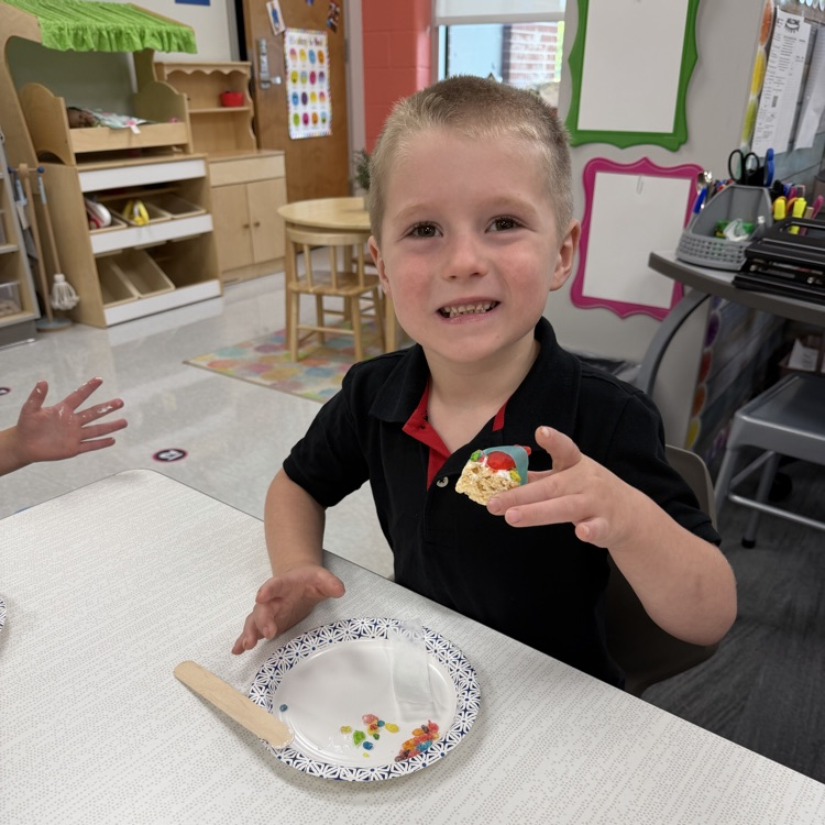 this image shows children and Miss Thompson’s class creating friendship sushi.