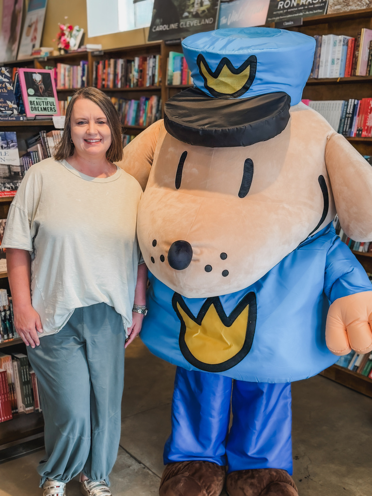 This image shows Mrs. Cassidy meeting Dogman at Hub City Books in Spartanburg.