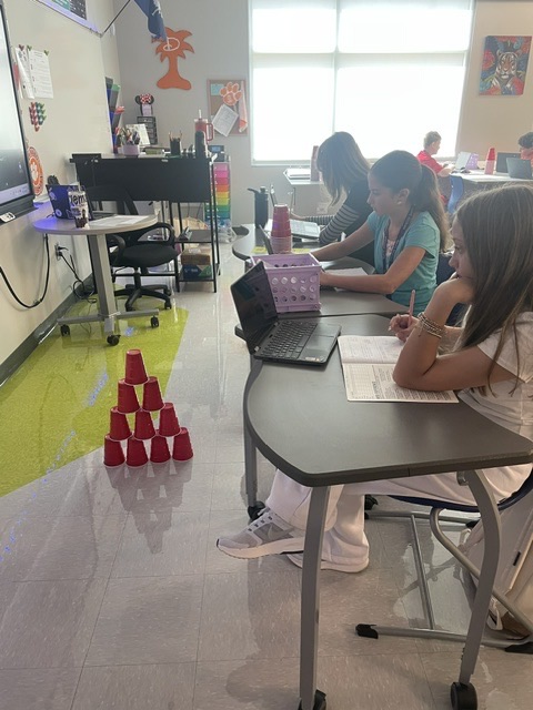 kids stacking cups