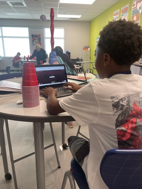 kids stacking cups