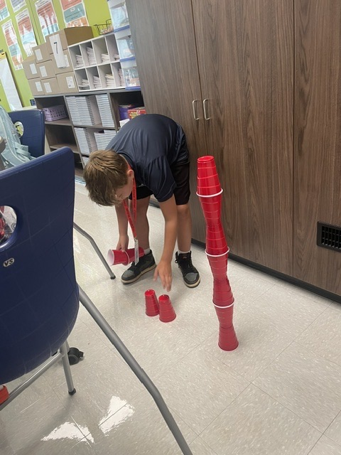kids stacking cups