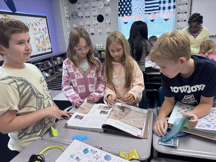 students reading maps