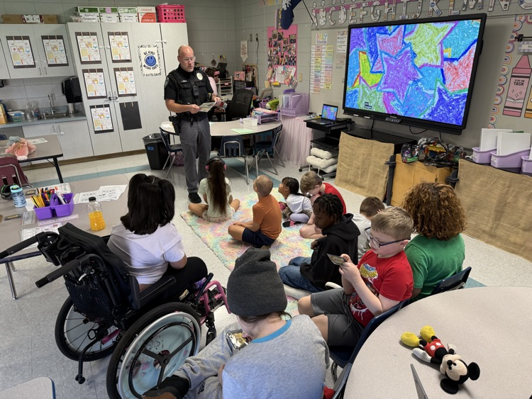 students with community helpers 