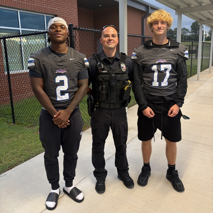 football players on car duty 