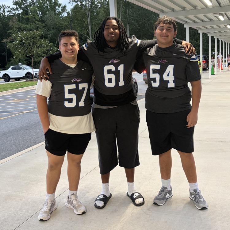 football players on car duty 
