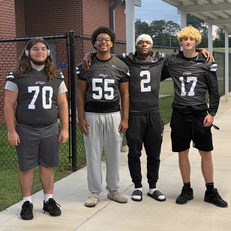football players on car duty 