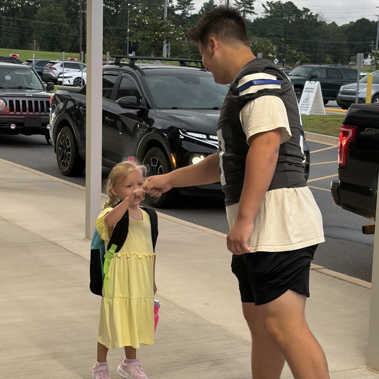 football players on car duty 