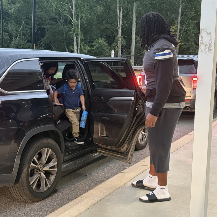 football players on car duty 