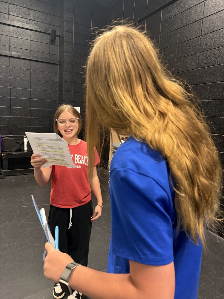 two students acting 
