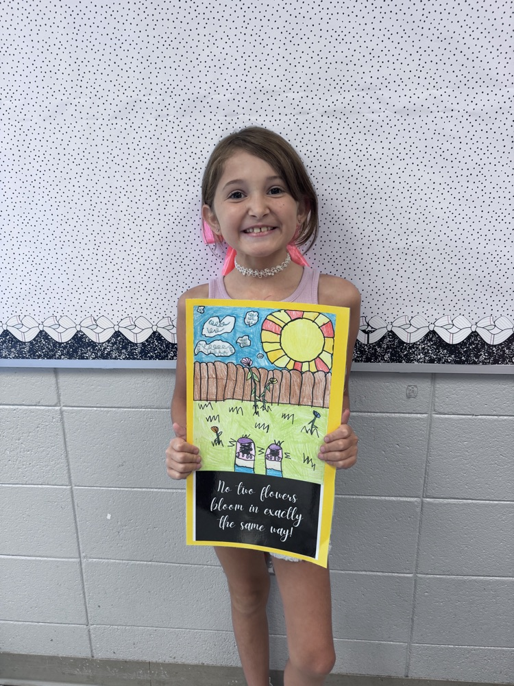 student sharing artwork and quote