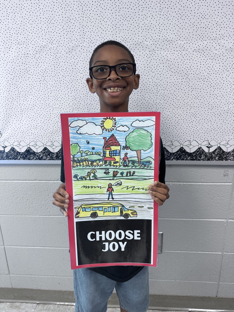 student sharing artwork and quote