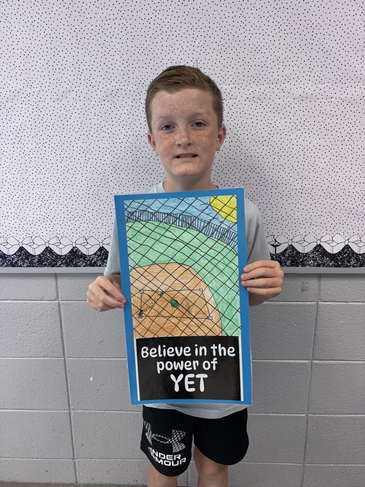 student sharing artwork and quote