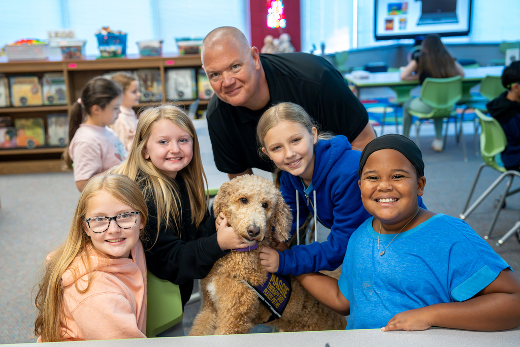 therapy dog with students