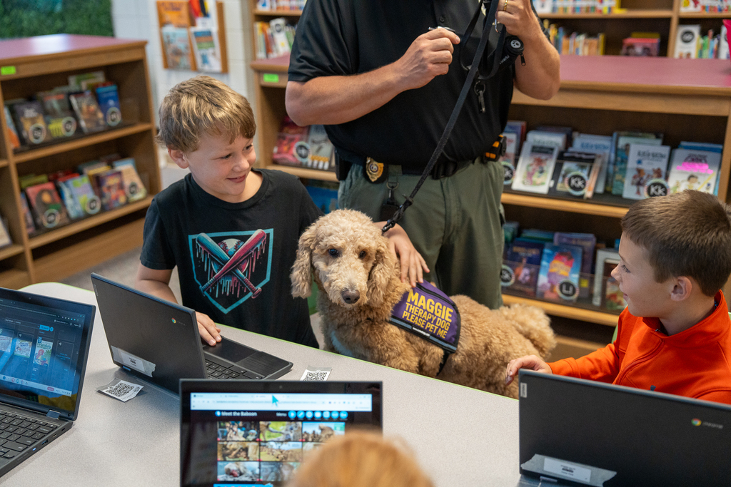 therapy dog with students