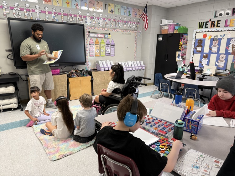 soldier reading to a class 