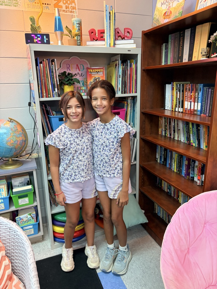 girls wearing matching clothes 