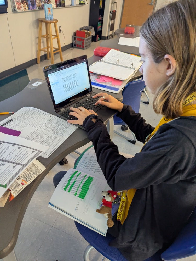 kids reading and annotating text